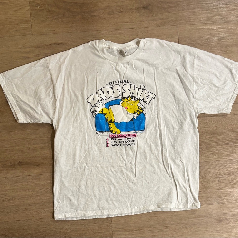 1990 white Jerzees “Official Dad’s Shirt”
